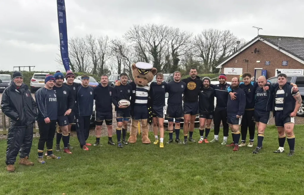 Ted Funnel Red Funnel Ferries Mascot poses with the Ventnor 1st XV 22nd Nov 2025